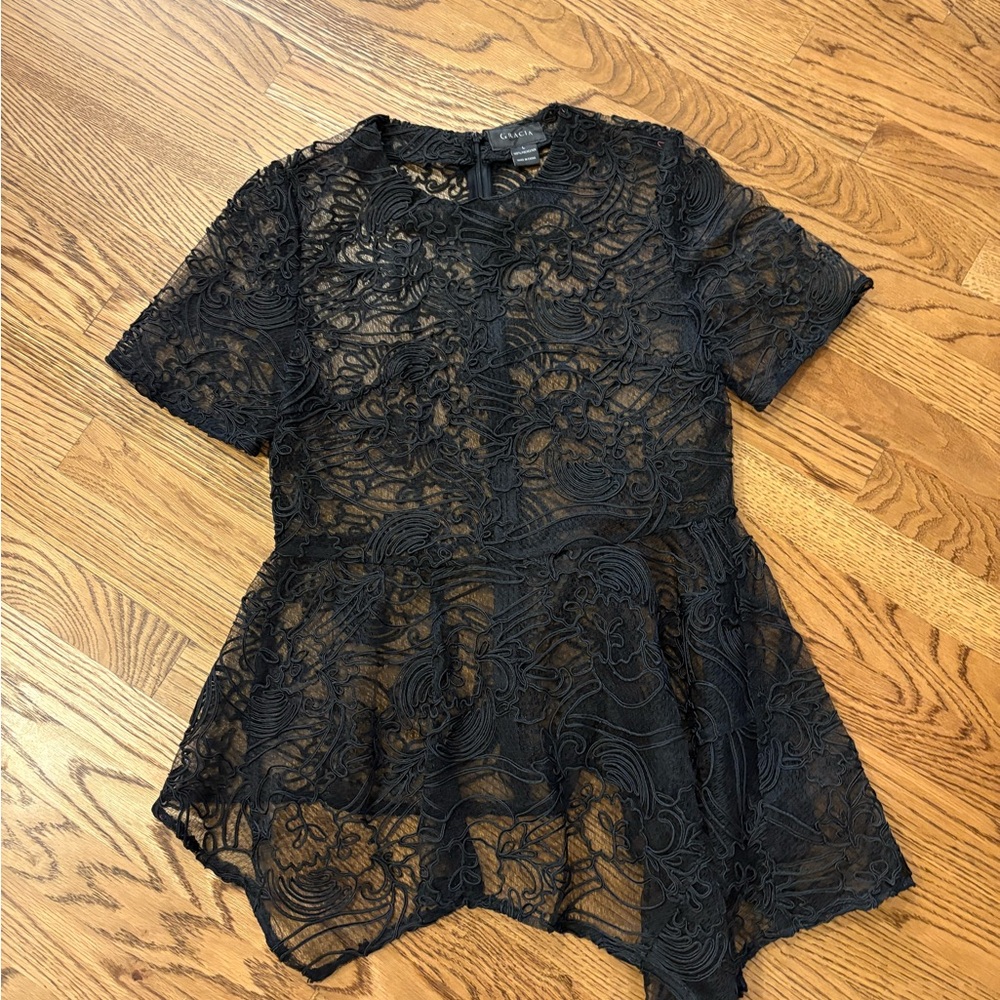 Garcia black lace sheer peplum top size L. Zips in back, longer in front
